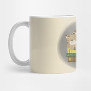 Cute cat sleeping on books Mug